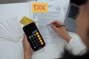 taxe immobiliere plus value 2026 calcul exonerations et abattements expliques 1